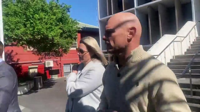 Belinda Simmonds leaving Wollongong Local Court with husband Reece Simmonds.