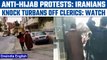 Iran: Young protesters knock turbans off clerics as part of anti-hijab protests | Oneindia News*News