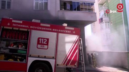 Yanan iş yerini gözyaşlarıyla izledi