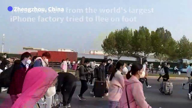 China: Foxconn workers try to escape lockdown around iPhone plant