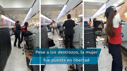 Mujer pierde los estribos y agrede a personal del AICM; rompe equipo de cómputo