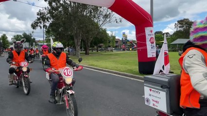 People in character helmets for charity ride end in Armidale. Video by Rachel Gray