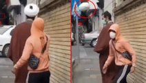 İran'da protestolar sürüyor! Gençler yolda yürüyen mollaların sarıklarını bir bir yere düşürüyor