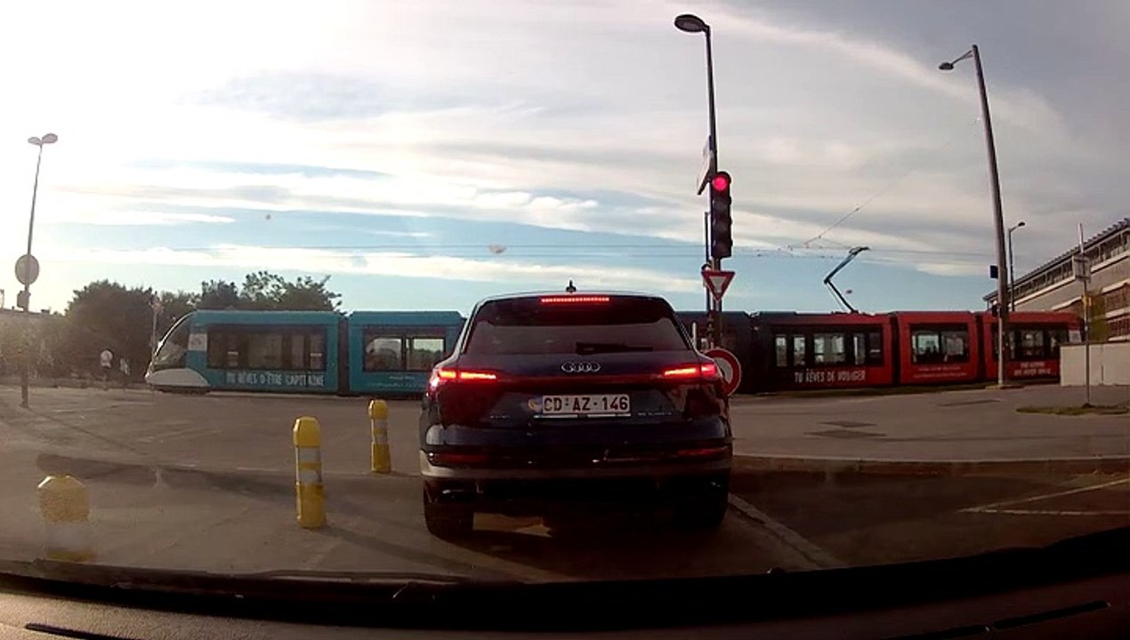 On a bike in a mini skirt and a scooter