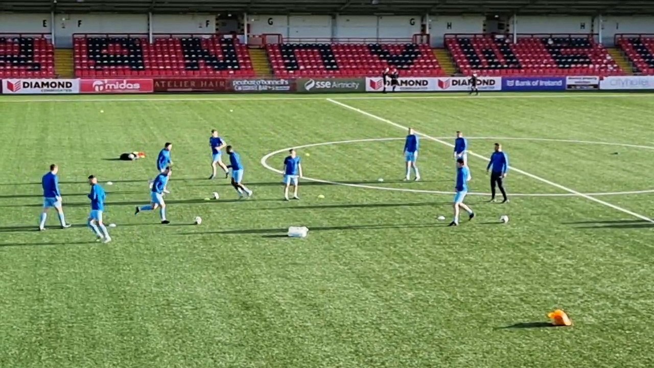 Institute players going through a warm-up drill.