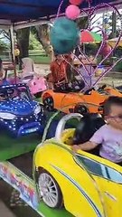 rafka is happy to ride a merry-go-round