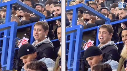 Cheeky Arsenal Fan is Hilariously Spotted 'Hiding' in the Chelsea End at Stamford Bridge