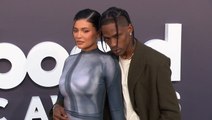 Kylie Jenner Snuggles Up To Travis Scott At Mom Kris’ Birthday