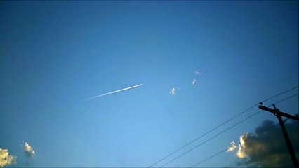 MCH 350 JET GOING 500 MPH OVER THE ALBERTA CANADA BLUE SKIES WITH JET STREAM .