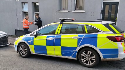 Police cars damaged