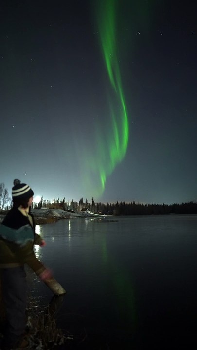 Rock Chirping Under Northern Lights