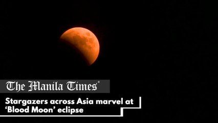 Stargazers across Asia marvel at ‘Blood Moon’ eclipse