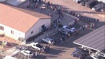 Aerial footage reveals long queues outside Phoenix polls as officials announce technical difficulties