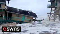 Tropical Storm Nicole: Building submerged by water after partly collapsing into the ocean