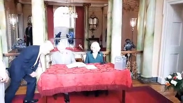 King Charles signs the visitors' book at Doncaster Mansion House