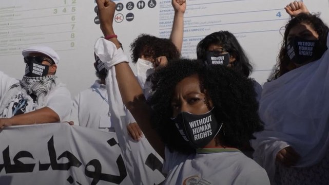 Activists stage silent protest at Cop27 against human rights abuses