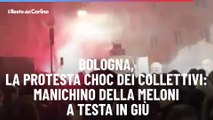 Bologna, la protesta choc dei collettivi: manichino della Meloni a testa in giù