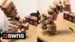 Visual effect artist brings Jenga tower to life in mind-boggling video - and reveals exactly how he did it