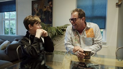 Alan Carr surprises young superfan with job offer to play him