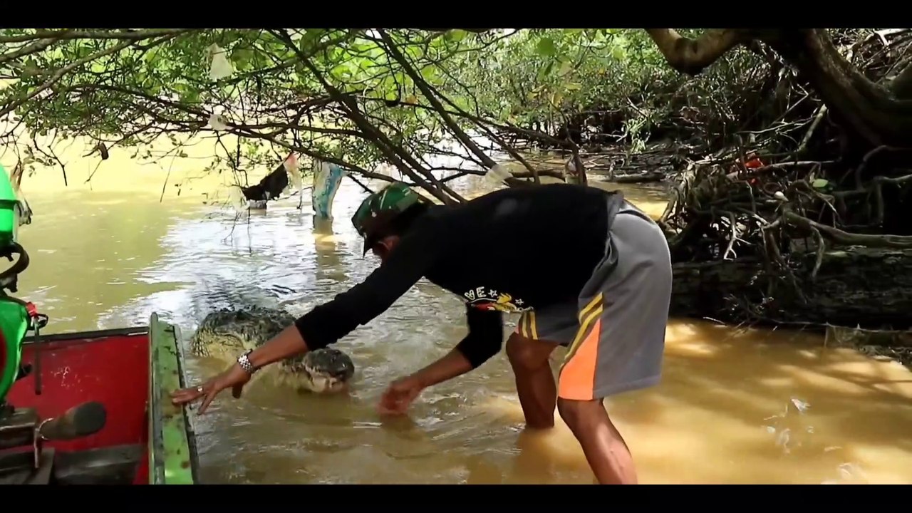 Ambo's father was determined to go down into the water to scan the large rock that was blocking Riska.