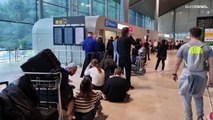 Hundreds stranded at Valencia airport after storm floods the runway