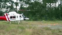 The NSW SES slinging sandbags by helicopter to those who need them.