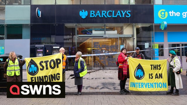 Climate activists smear Barclays windows with black paint in protest at bank's funding of fossil fuel industries