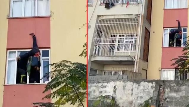 Anahtarı unutan adam, terastan halatla sarkarak daireye girmeye çalıştı! Asılı kalan şahsı itfaiye ekipleri kurtardı