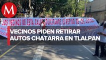 Vecinos protestan y exigen quitar autos chatarra en Tlalpan