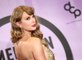 Taylor Swift Paired Her Signature Side Bang with a Backless Jumpsuit at the 2022 AMAs