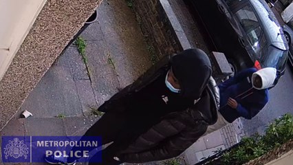 Video footage showing two men about to break into a woman's home in Wandsworth