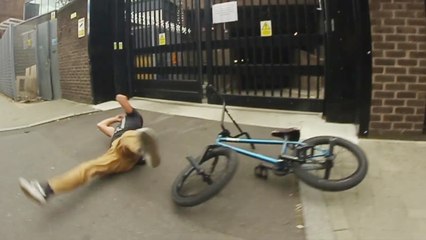 Loss of focus leads to BMX rider crashing to the ground mid-stunt