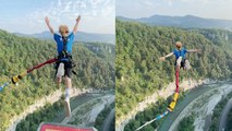 INSANE BUNGEE JUMP! Adventure-lover jumps off 200  meters bridge without hesitation