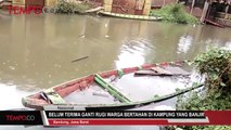 Belum Terima Ganti Rugi Warga Bertahan di Kampung yang Banjir