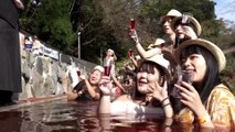 Japanese wine bath event draws crowds despite rising costs