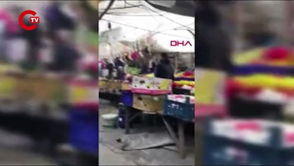 Alışverişe gelmişti... Pazarcıların silahlı kavgasında yaralandı