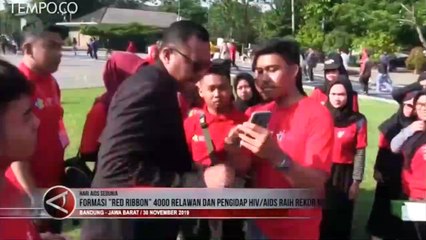 Descargar video: 4000 Relawan dan pengidap HIV/Aids Pecahkan Rekor MURI