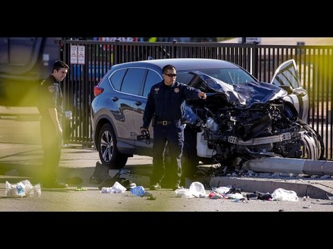 Driver arrested on suspicion of attempted murder after car hits 25