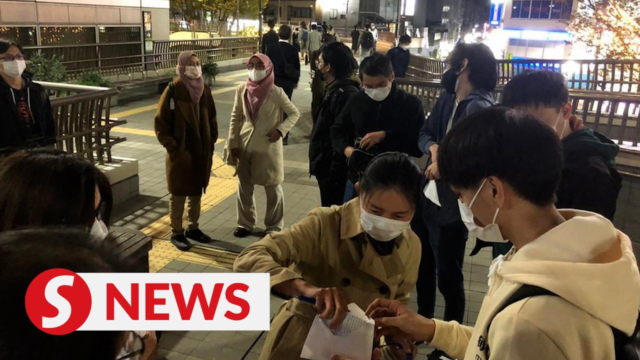 GE15: Volunteers race against the clock to deliver postal votes from Japan