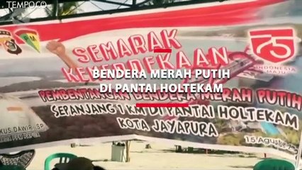 Bendera Merah Putih Sepanjang 1 Kilometer di Pantai Holtekam