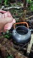 Solo Camping Cooks Water in a Tent for Coffee When it Rains