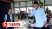 GE15: Anwar casts his vote before departing for Tambun