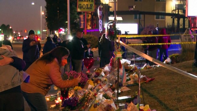 Mourners gather at memorial for victims of shooting at LGBTQ+ nightclub in Colorado