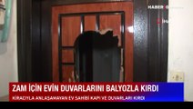 Zam için evin duvarlarını balyozla kırdı