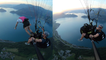 Adrenaline-junkie pulls off INSANE base jump while paragliding over heavenly peaks of Switzerland