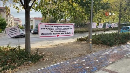 Kendini affettirebilmek için eşinin çalıştığı marketin karşısına pankart astı