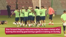 Neymar swarmed after winning goal in Brazil training