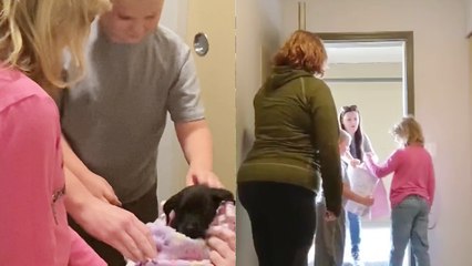Girl delivers a surprise dog to kids' home and makes their day!
