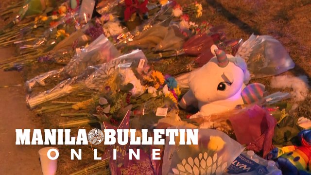 People pay respects at memorial for Colorado Springs shooting victims