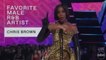 AMAs: Kelly Rowland tells crowd to ‘chill out’ as they boo Chris Brown win